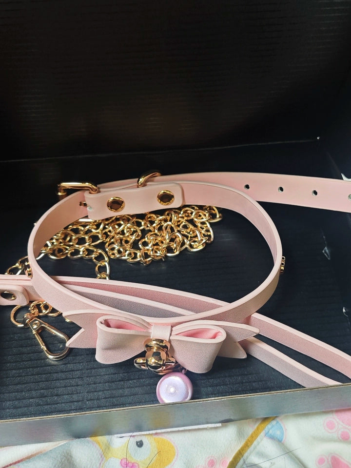 Customer review image of a pink leather choker collar set